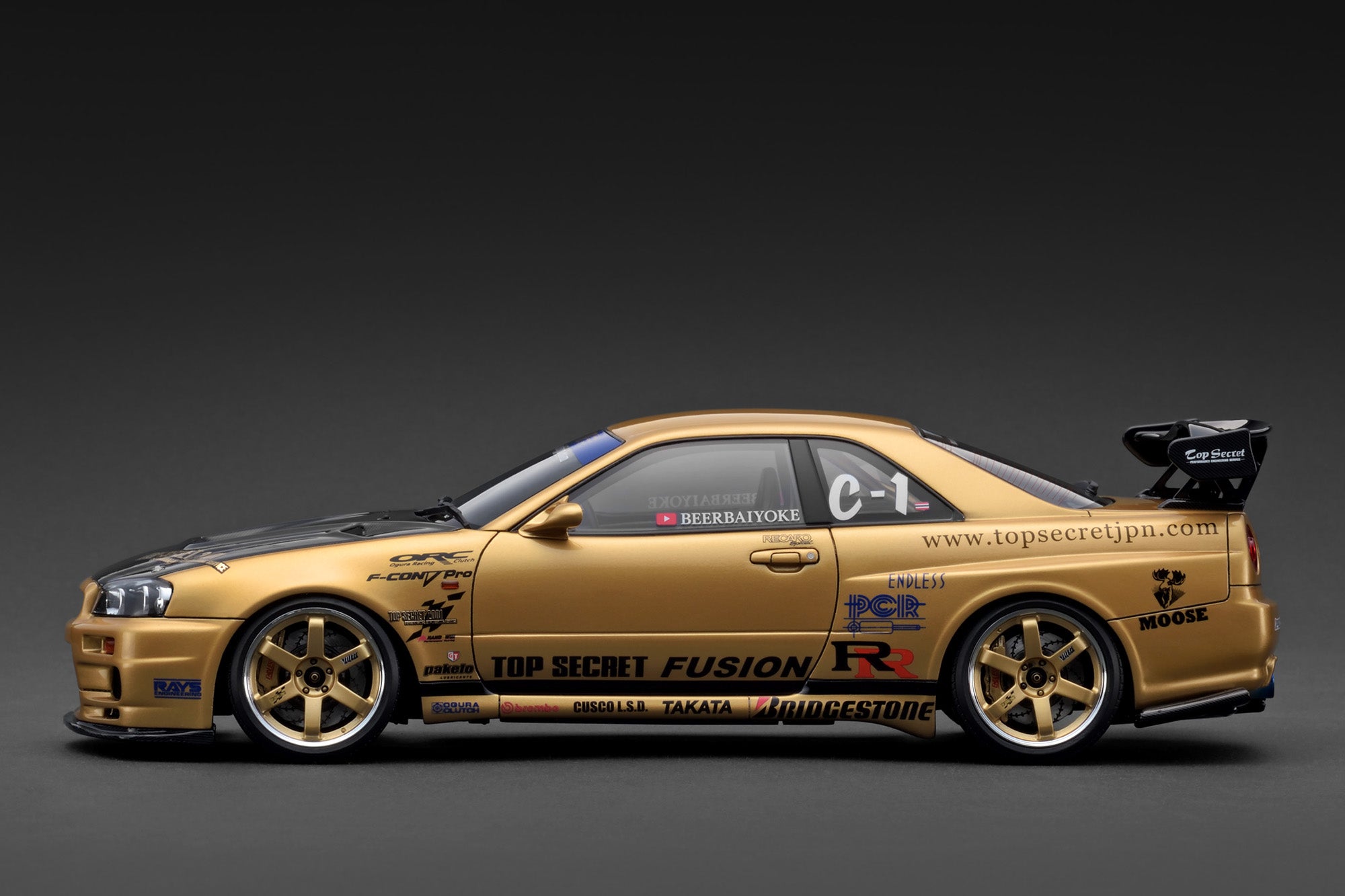 Ignition Model 1:18 Nissan Skyline 34GT-R (R34) TOP SECRET in Gold