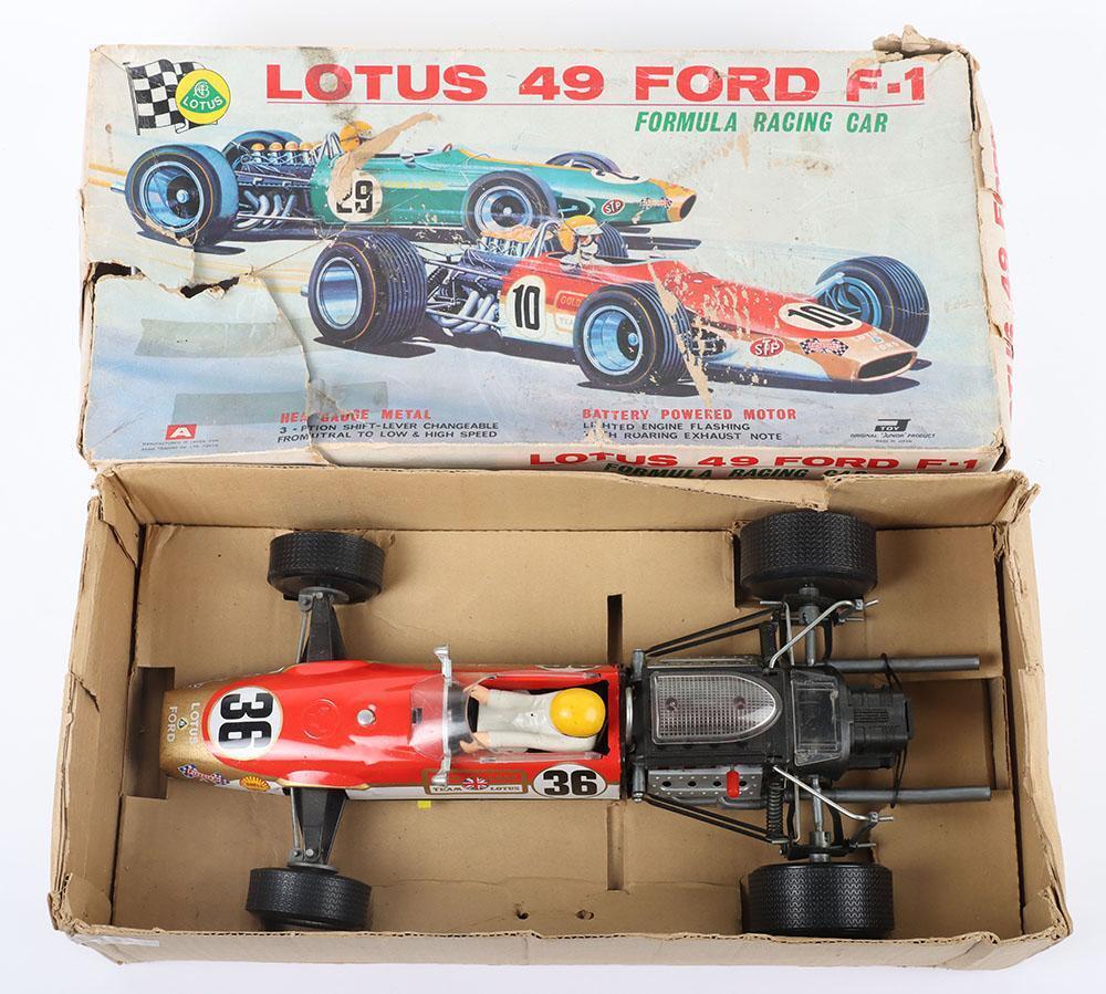 Original Junior Products (Japan) tinplate battery operated Lotus