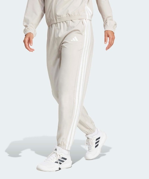 トレイン エッセンシャルズ スリーストライプス ウーブンパンツ