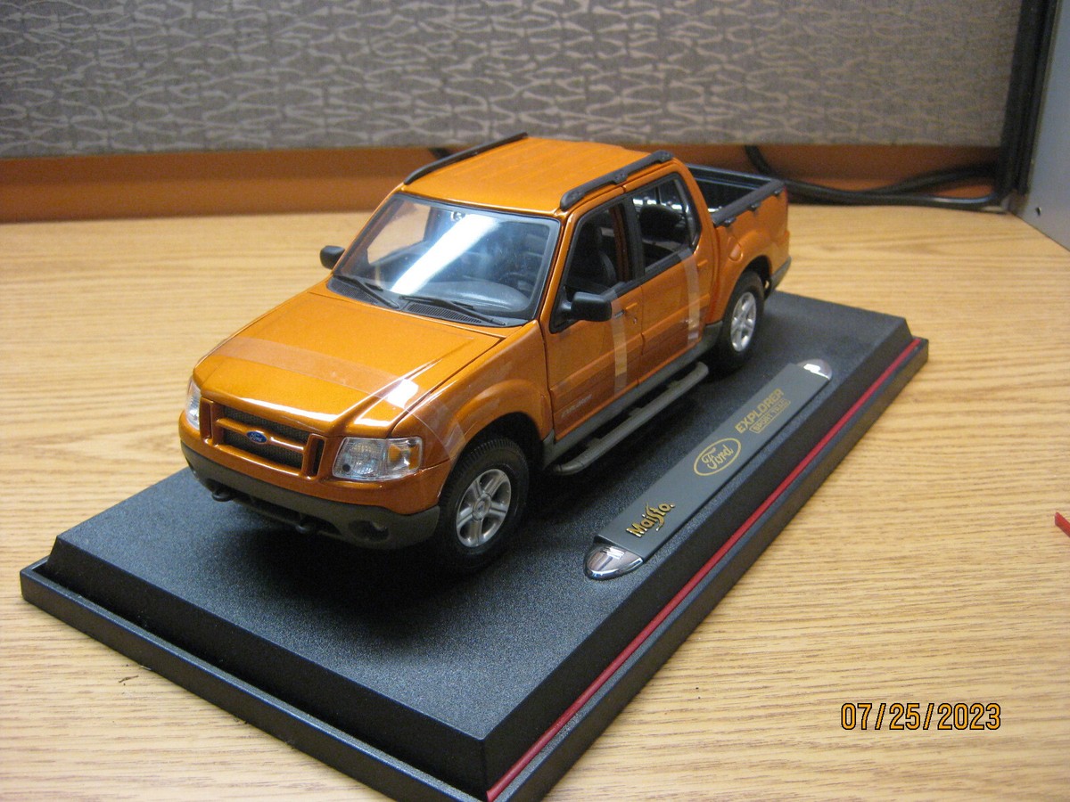 1/18 2002 FORD EXPLORER SPORT TRAC IN GOLD BY MAISTO # 36891 | eBay