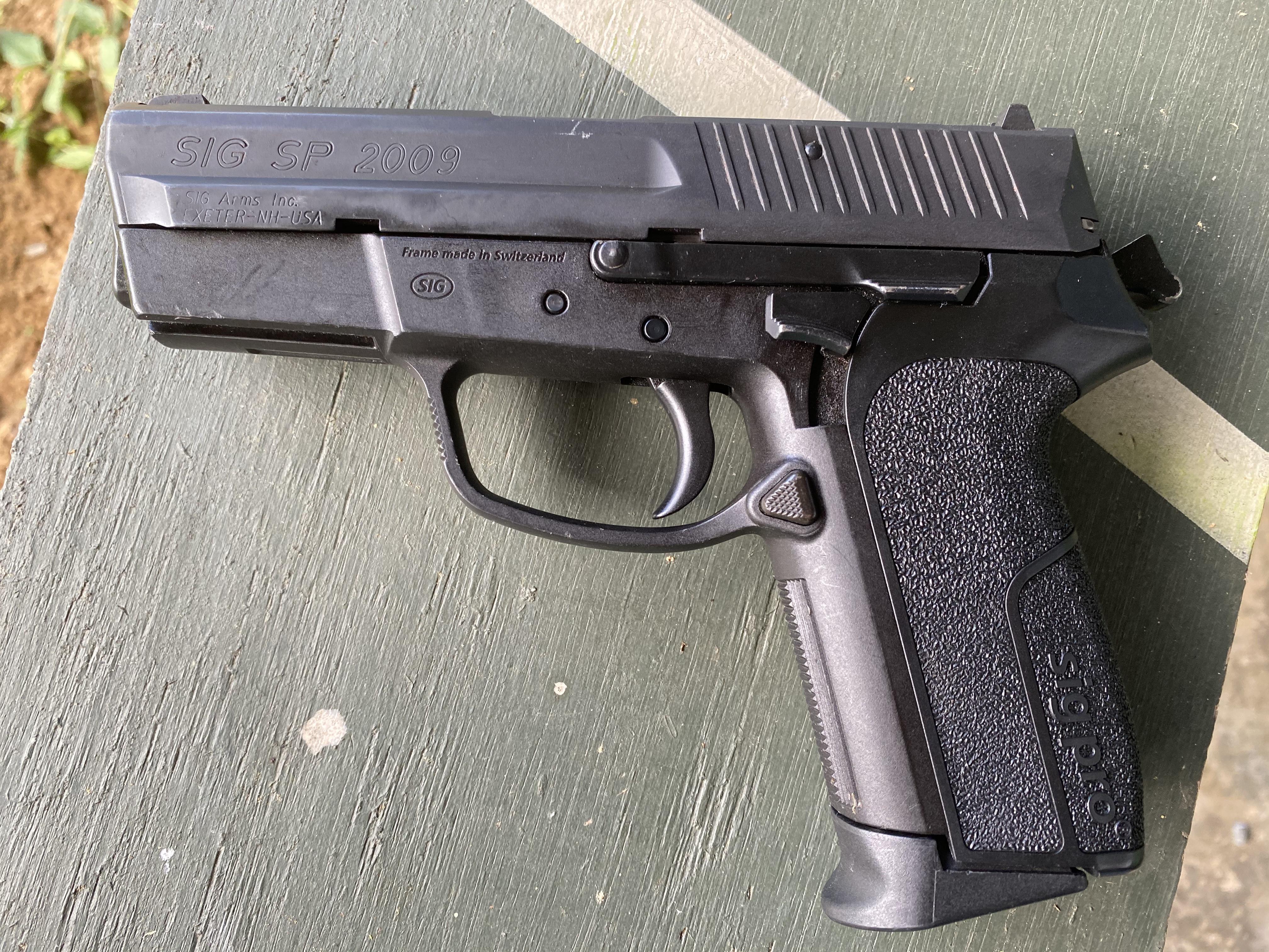Sig Sauer SP 2009 at the range for practice : r/guns