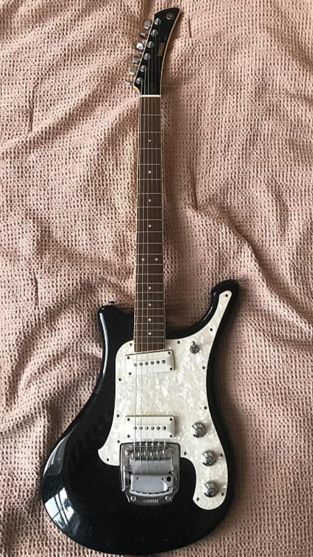 Does anybody have any information on Yamaha SGV800 : r/guitars