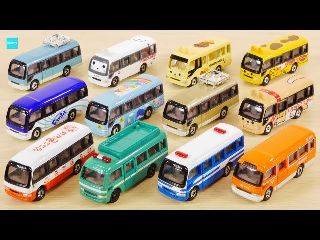 All 13 Tomica coasters: police car, mail car, bus, shuttle car