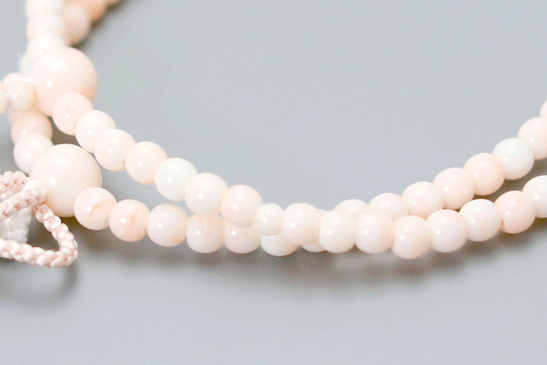 数珠 女性用 二連 京匠の伝統 ピンク珊瑚二輪 人絹頭房 浄土真宗 仏壇