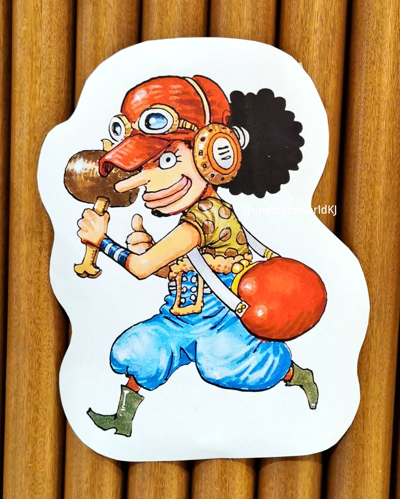 尾田先生の描いたウソップ像の色紙と99巻と手配書。 Usopp statue