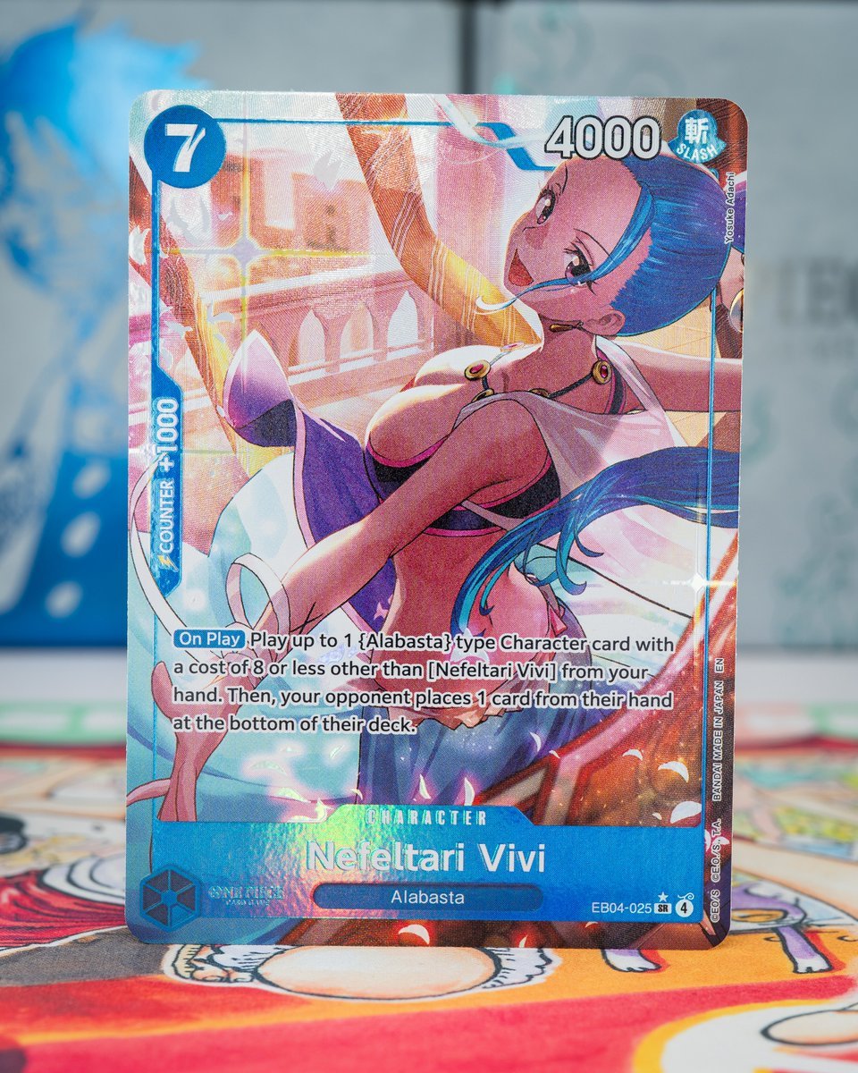 Official in-person shots of the alt art and regular Vivi cards in