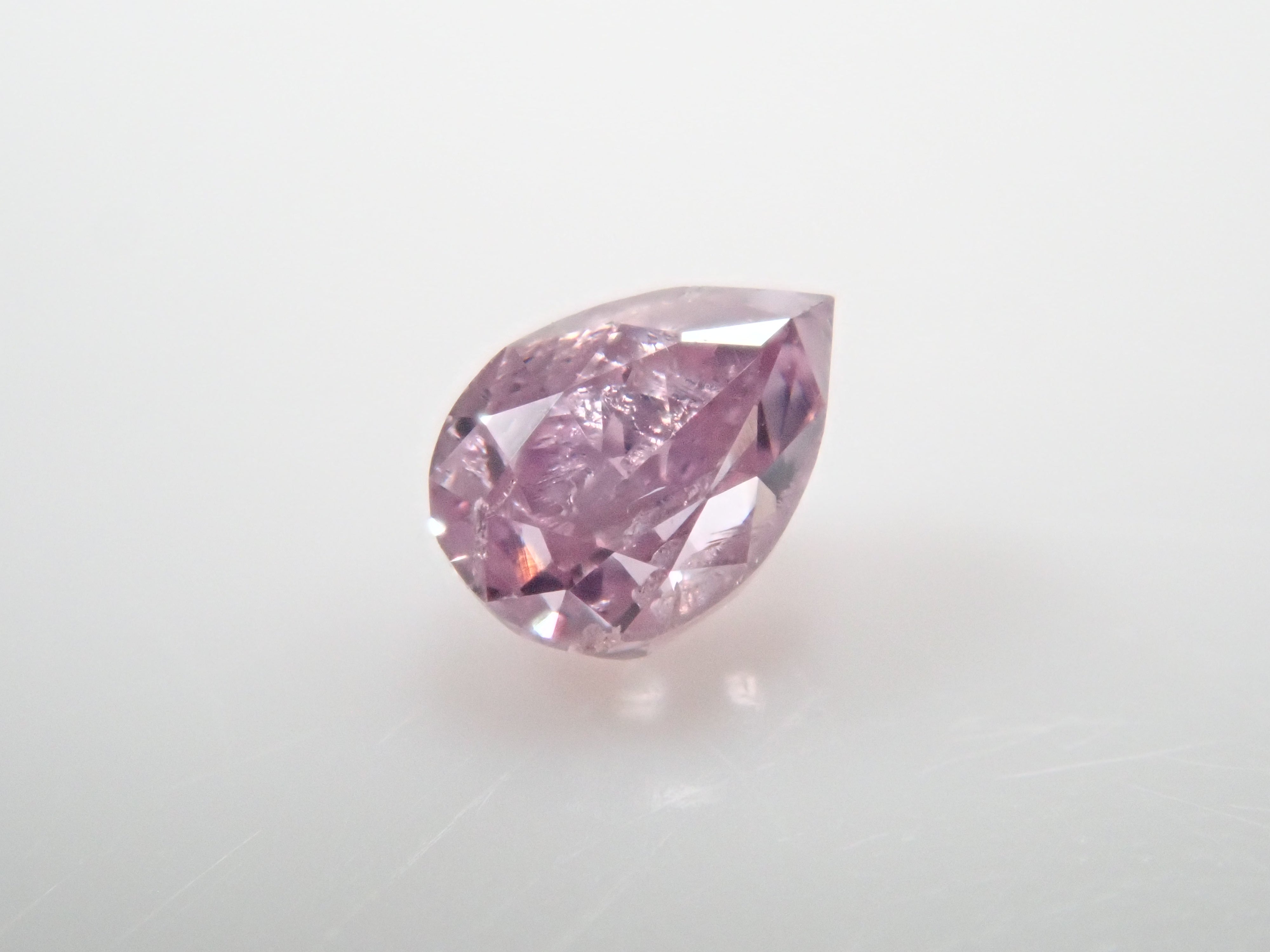 パープルダイヤモンド 0.070ctルース(FANCY VIVID PINK PURPLE, I-1)